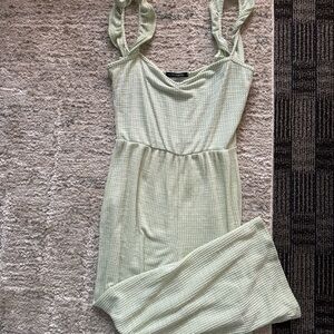 green and white jumpsuit